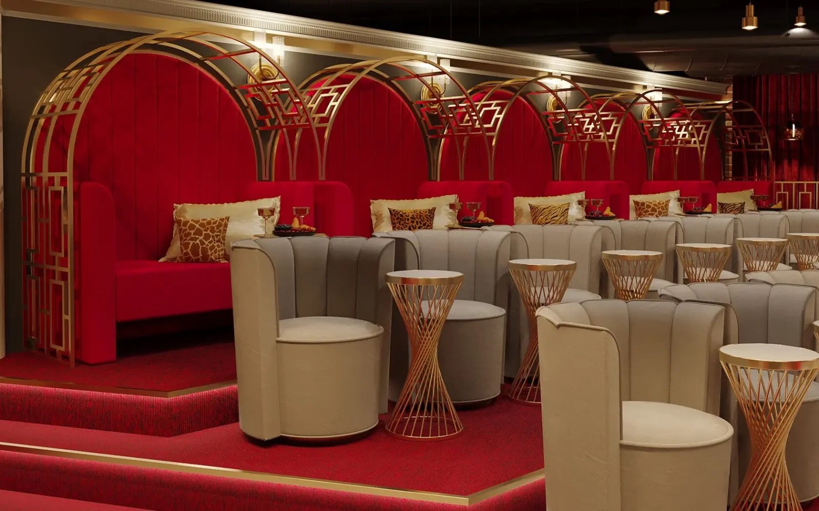 Mon Reflets'i teatri saal: messingist art deco kaared ja punased sametboksid.